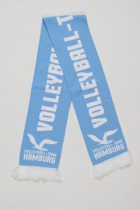 Blauer Schal mit dem Schriftzug 'VOLLEYBALL-TEAM HAMBURG' und weißen Fransen.