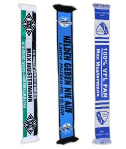 Drei individuelle Schals in verschiedenen Farben und Designs, darunter schwarz-grün und blau-weiß.