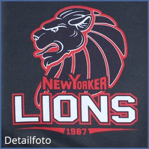Logo der New Yorker Lions mit einem stilisierten Löwenkopf und dem Schriftzug 'New Yorker Lions 1987'.