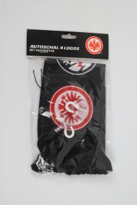 Schwarzer Autoschal mit vier Logos, verpackt in einer transparenten Plastikhülle.