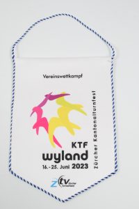 Wimpel für den KTF Wylant Vereinswettkampf 2023 mit bunten Symbolen und Datumsangabe.