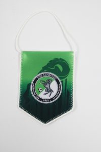 Wimpel des USV Scheffau mit grünem Hintergrund und Vereinslogo.