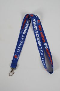 Blaues Schlüsselband mit dem Logo der Oettinger Rockets Gotha und dem Text 'Wir stiften Begeisterung'.