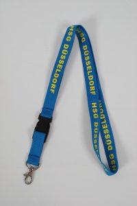 Blaues Schlüsselband mit gelben Aufdruck HSG Düsseldorf, ausgestattet mit einem Clipverschluss.
