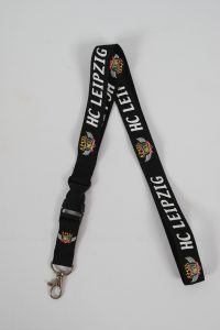 Schlüsselband in Schwarz mit dem Logo und Schriftzug von HC Leipzig.