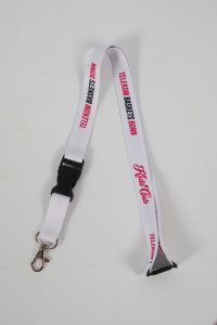 Weißes Schlüsselband mit dem Text 'Telekom Baskets Bonn' in roter Schrift.