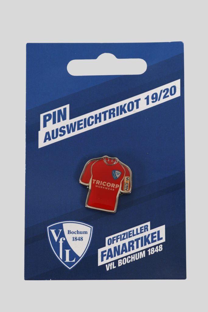 Pin in Form eines Ausweichtrikots des VfL Bochum mit dem Logo und der Aufschrift Tricorp.