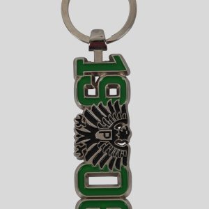 Schlüsselanhänger mit grünen Zahlen 1990 und einem Adler-Symbol in der Mitte.