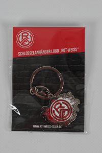 Schlüsselanhänger mit dem Logo von Rot-Weiss Essen in einer transparenten Verpackung.